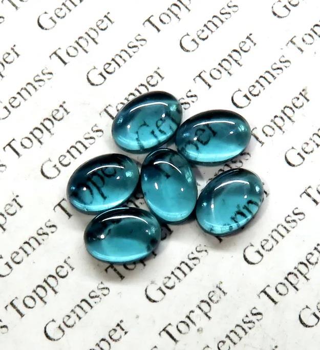 London Blue Topaz 8x10 mm Oval Cabochon